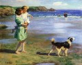 海辺のビーチで犬を連れた母親と少女 エドワード・ヘンリー・ポットハスト